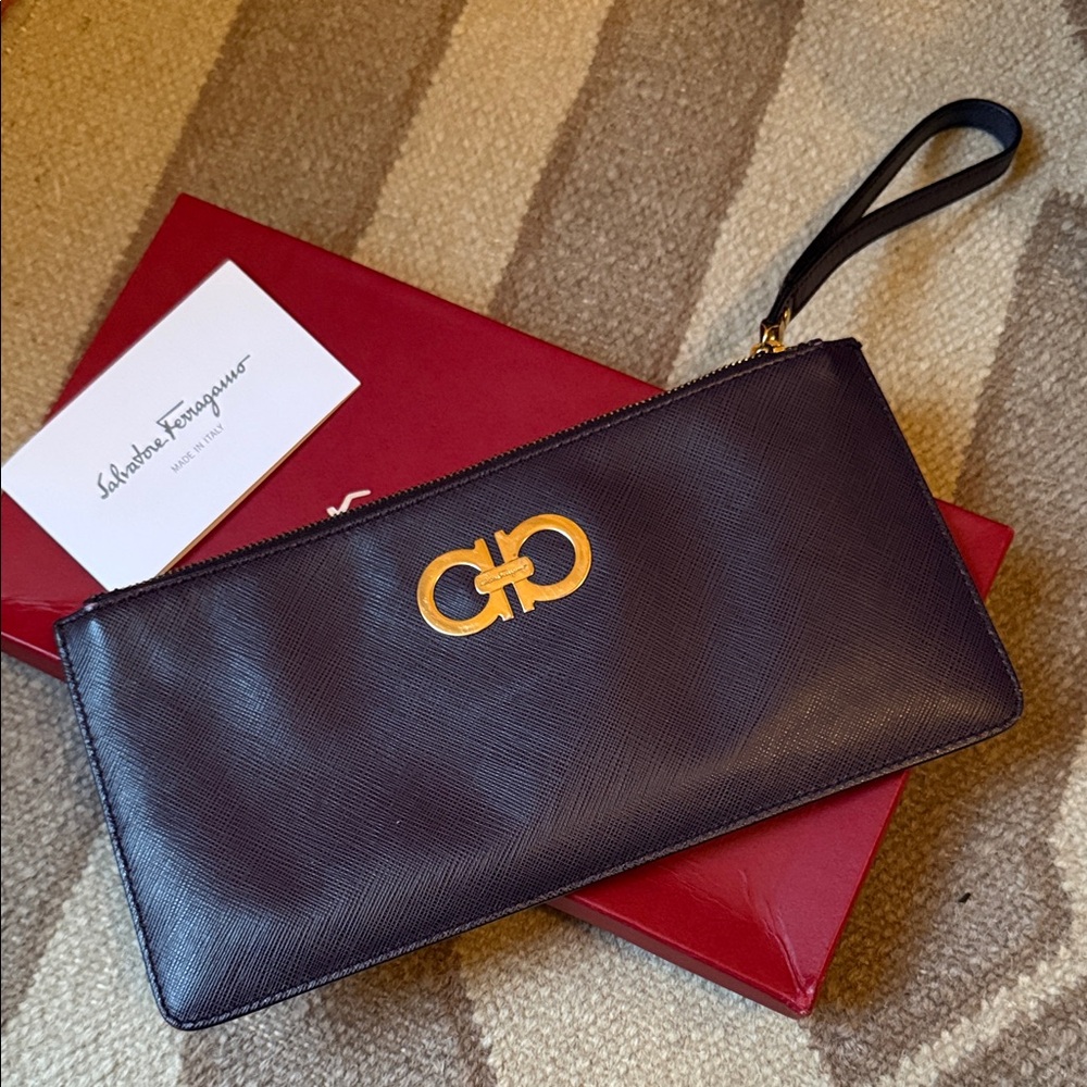 Salvatore Ferragamo Plum Leather Wristlet with Gold Accent